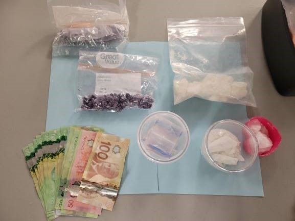 Female Driver In Custody After Stolen Vehicle Investigation Leads To Drugs, Cash And Handgun Seizure